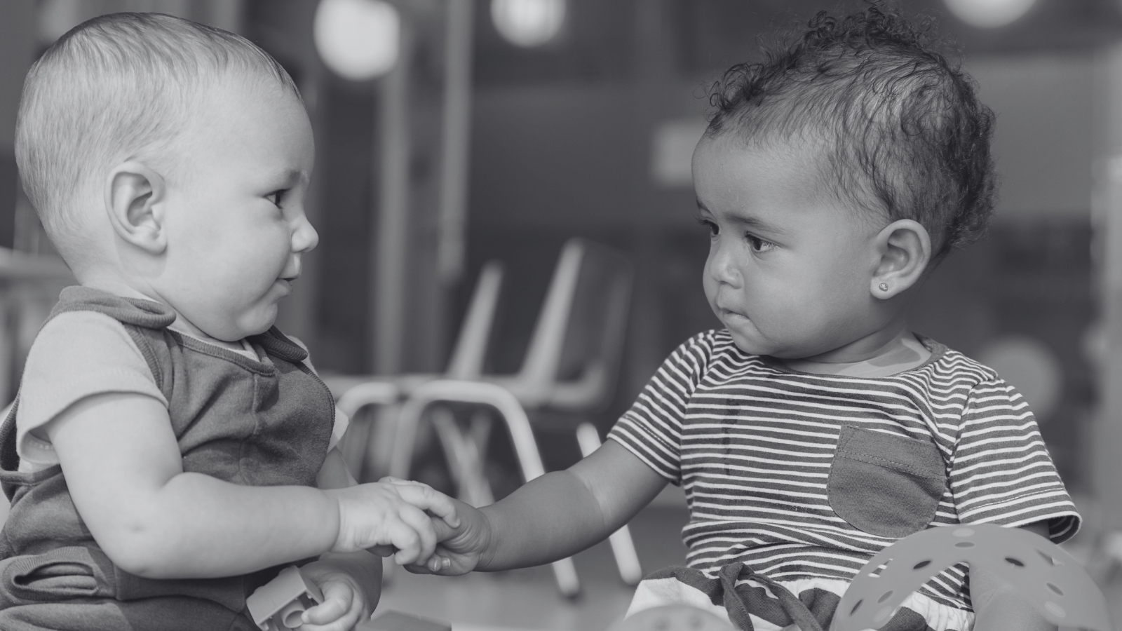 Babies playing in nursery